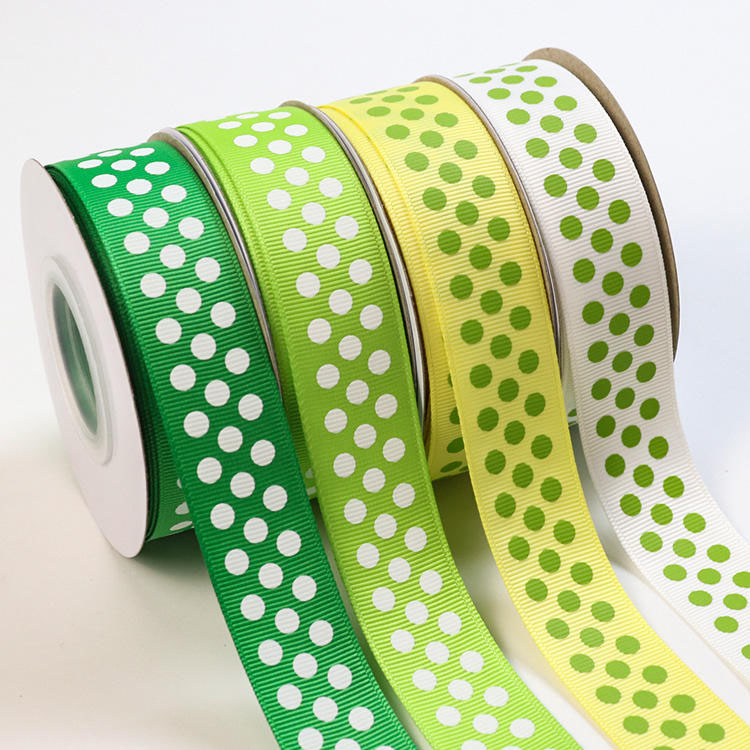 25mm vit prickig screentryckt rulle med grosgrainband