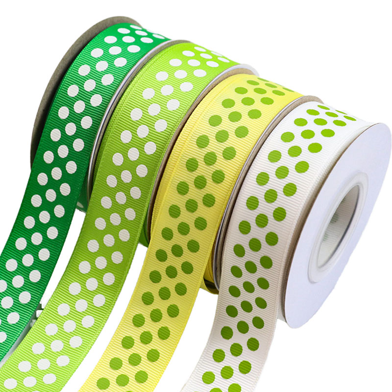 25mm vit prickig screentryckt rulle med grosgrainband