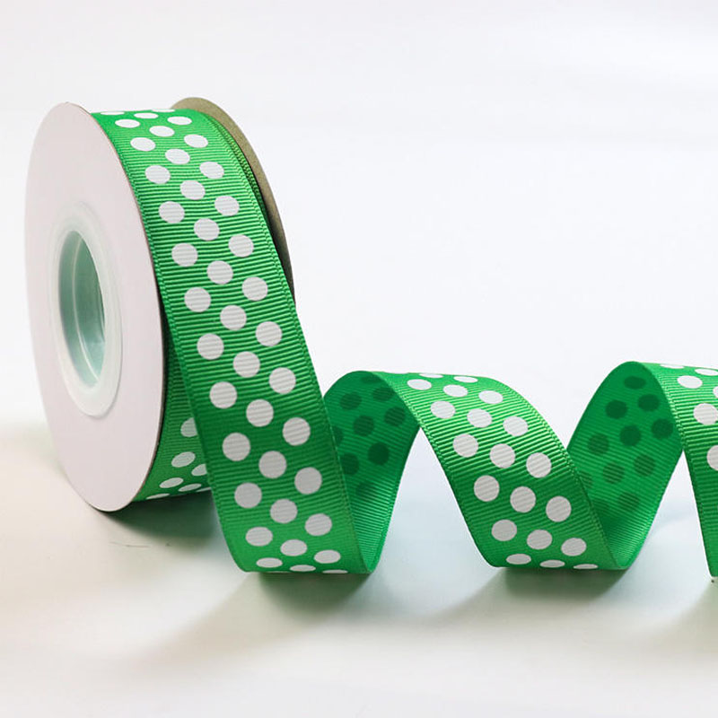 25mm vit prickig screentryckt rulle med grosgrainband