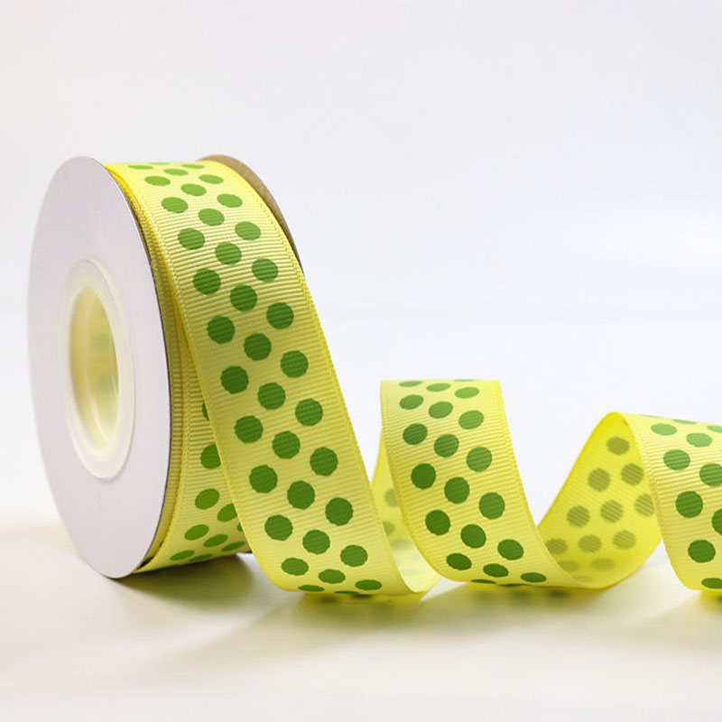 25mm vit prickig screentryckt rulle med grosgrainband